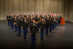 The Colorado Army National Guard's 101st Army Band, conducted by Chief Warrant Officer 2 Russell Massey, presents "Citizen Soldier," a musical and dramatic concert experience celebrating military service at the Vance Brand Auditorium at Skyline High School in Longmont, Colo. May 25, 2014 in honor of Memorial Day. The 101st has acted as a musical ambassador for the state of Colorado and the United States Army since its federal recognition, September 18,1937, as the band section of Service Battery, 168th Field Artillery in Denver, Colo. Standing as a separate entity in the 21st century, the band is comprised of approximately 50 Citizen-Soldiers. Within the band is individual musical performance teams, including the Centennial Wind Ensemble, Mile High 101st Rock Band, 101st Army Dixieland Band, Open Range Country Band and Marching Band. (U.S. Army National Guard photo by Spc. Kristin Stoneback/Released)