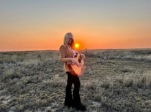 Clare Dunn performing at the Future of Rural America Concert in Flagler, Colorado, on August 8, 2026